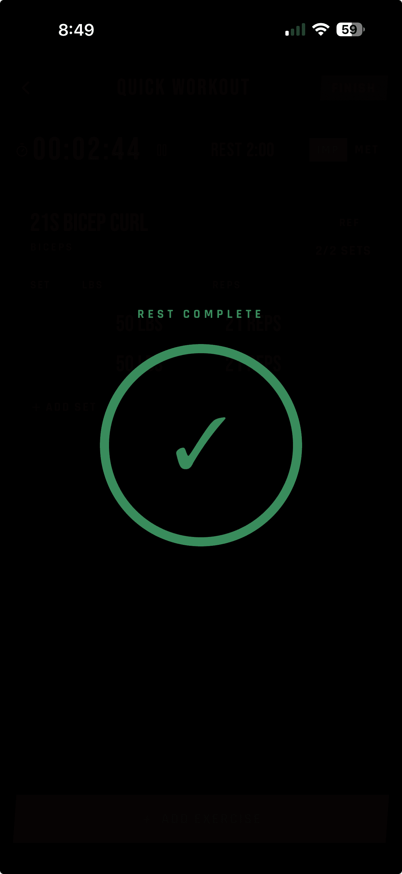 LIFTL rest timer complete state with a green ring and checkmark
